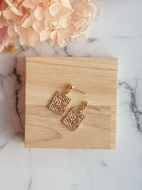 Daisy print studs