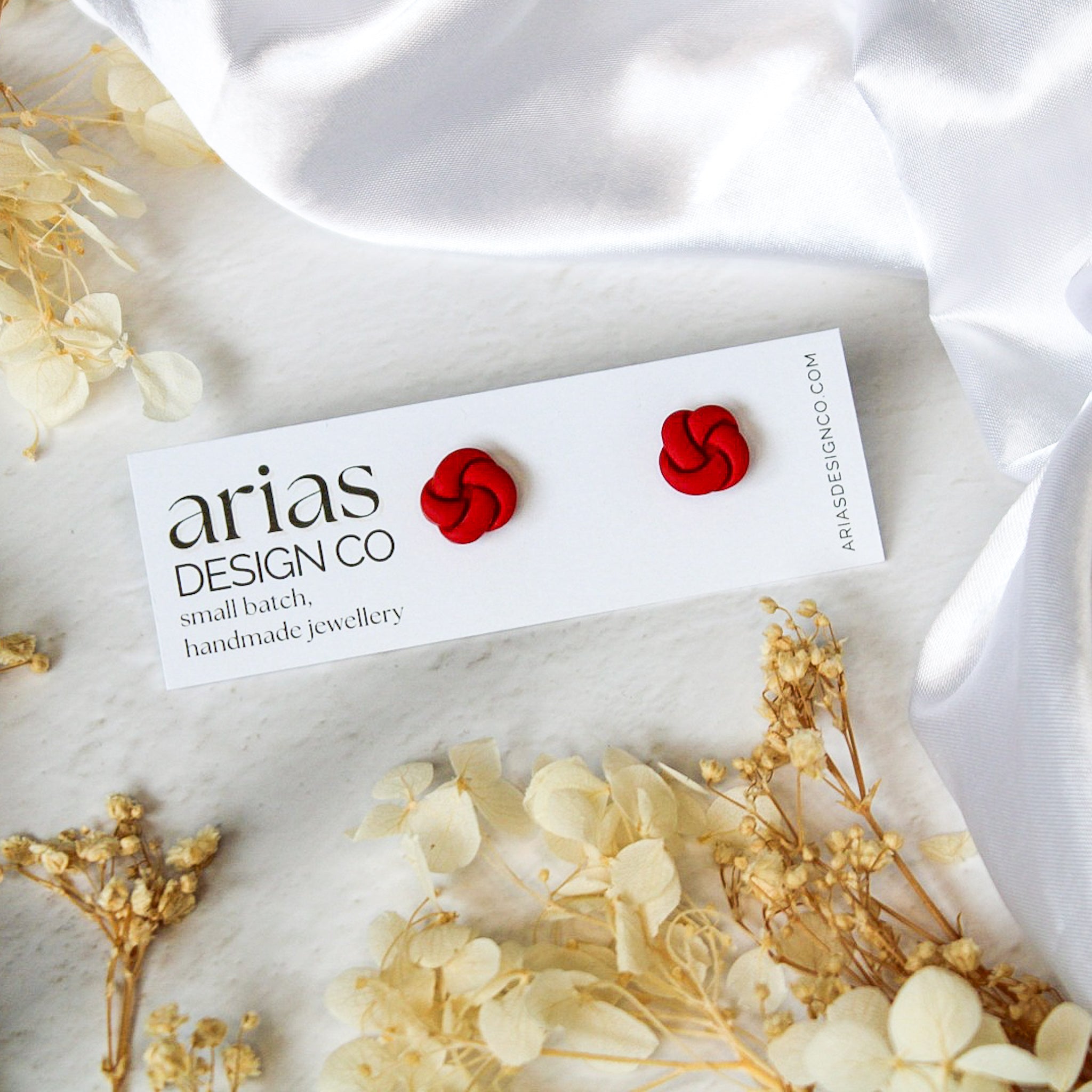 Red / Stud / Stainless steel